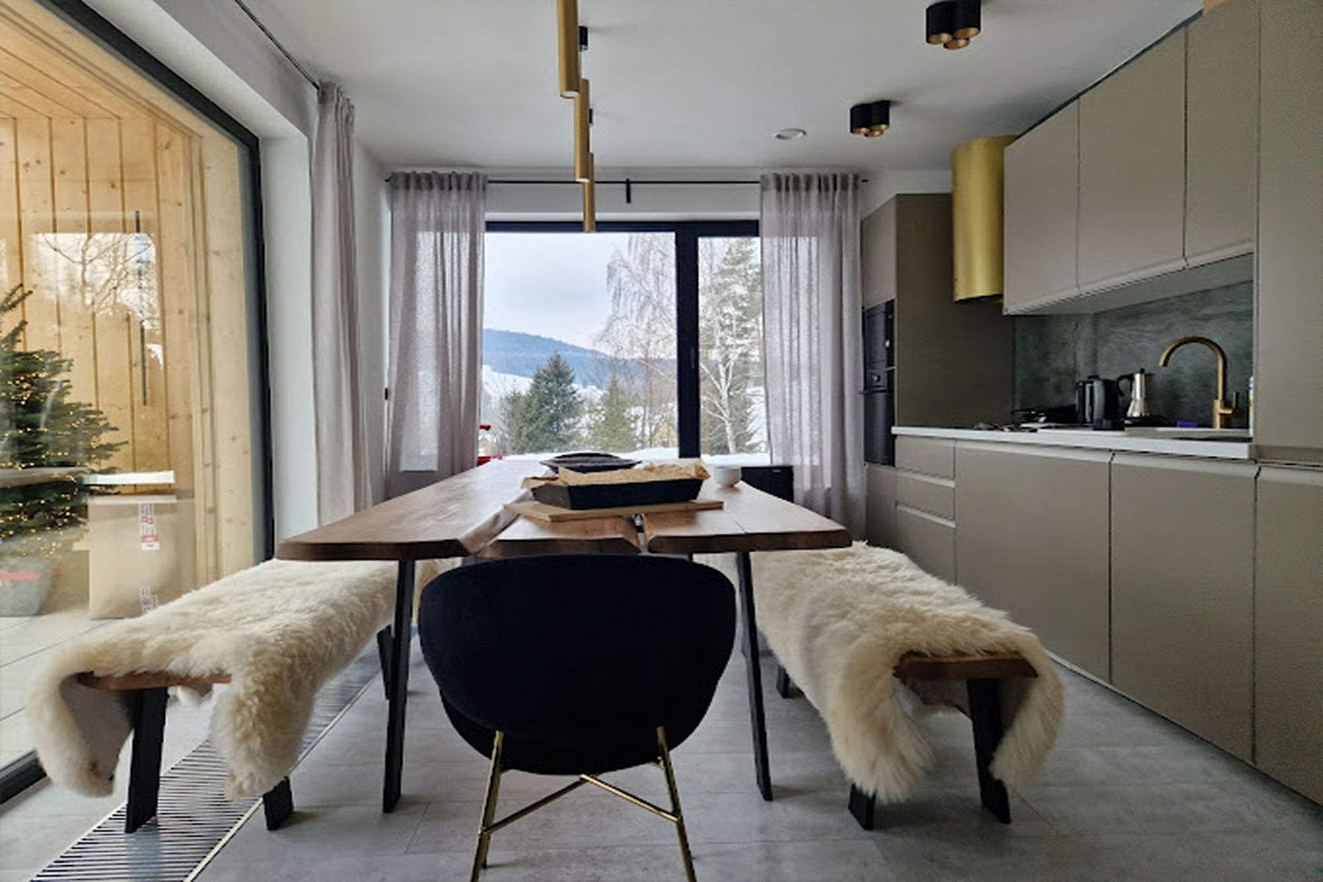 Living room with dining area and garden view